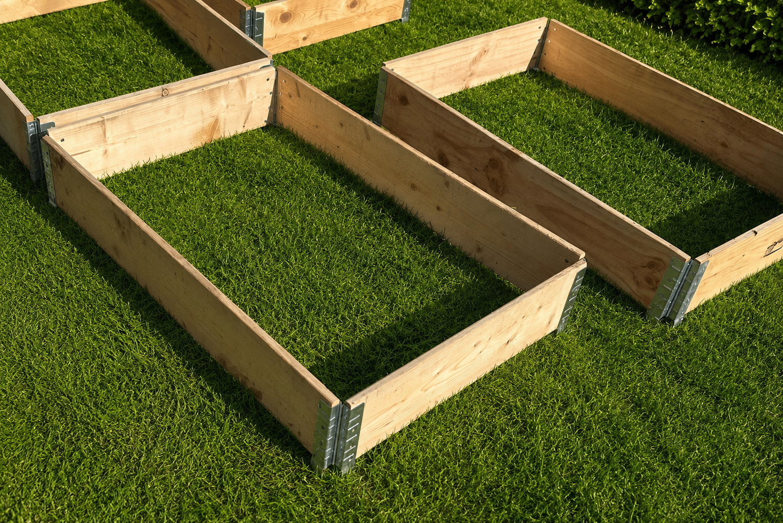 Natural pine HuertoBox raised planter boxes on green grass